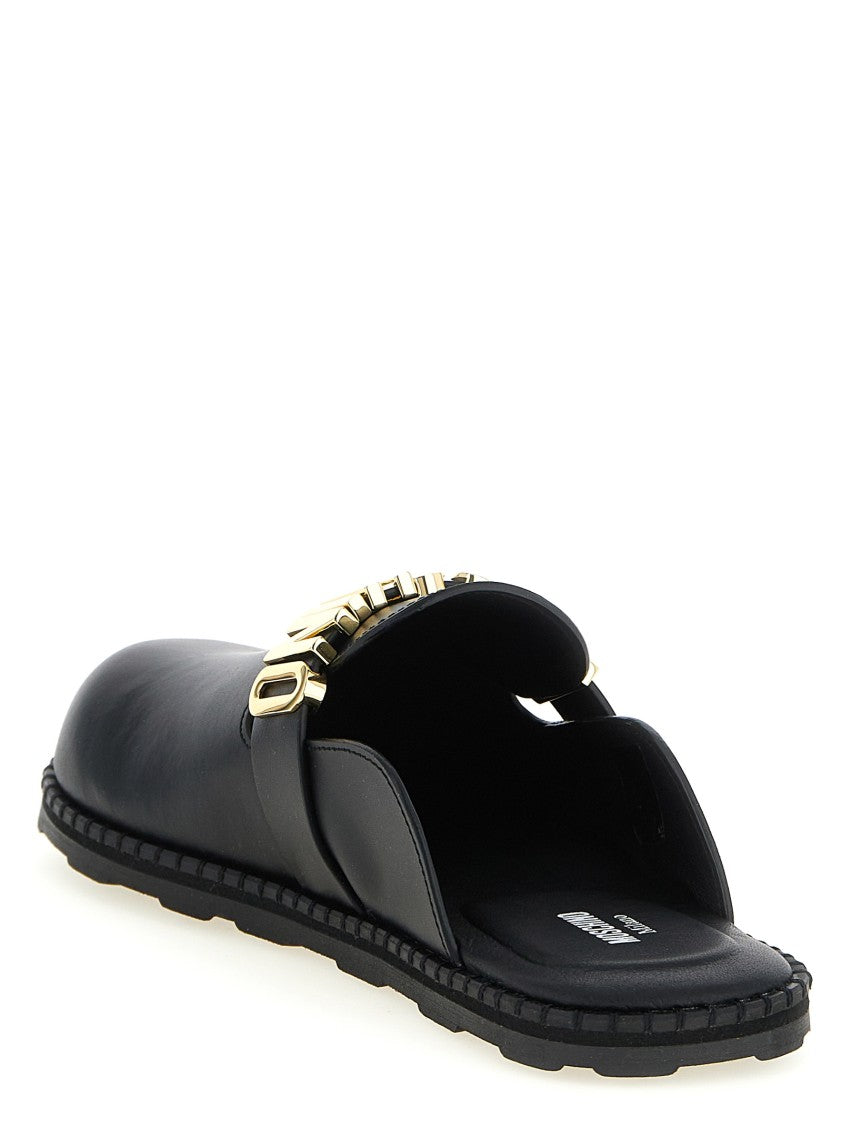 Moschino Black Leather Sabots With Bold Logo Strap