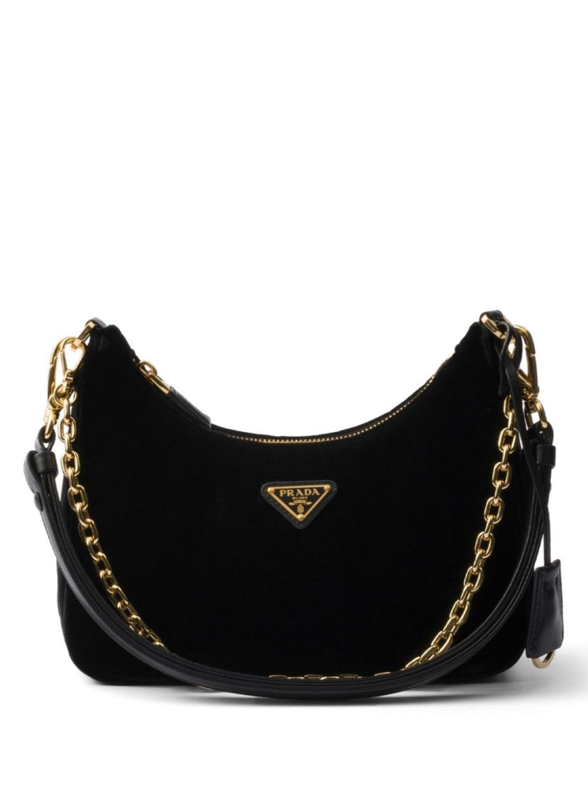 Prada Curved Black Bag With Gold Chain Strap And Logo Plaque