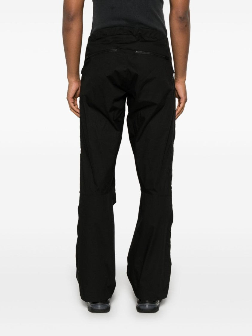 Gr10k Adjustable Black Pants With Concealed Fastenings And Zip Details