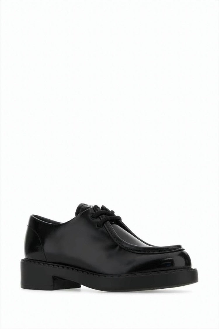 Prada Polished Black Leather Loafers With Classic Lace-Up Design
