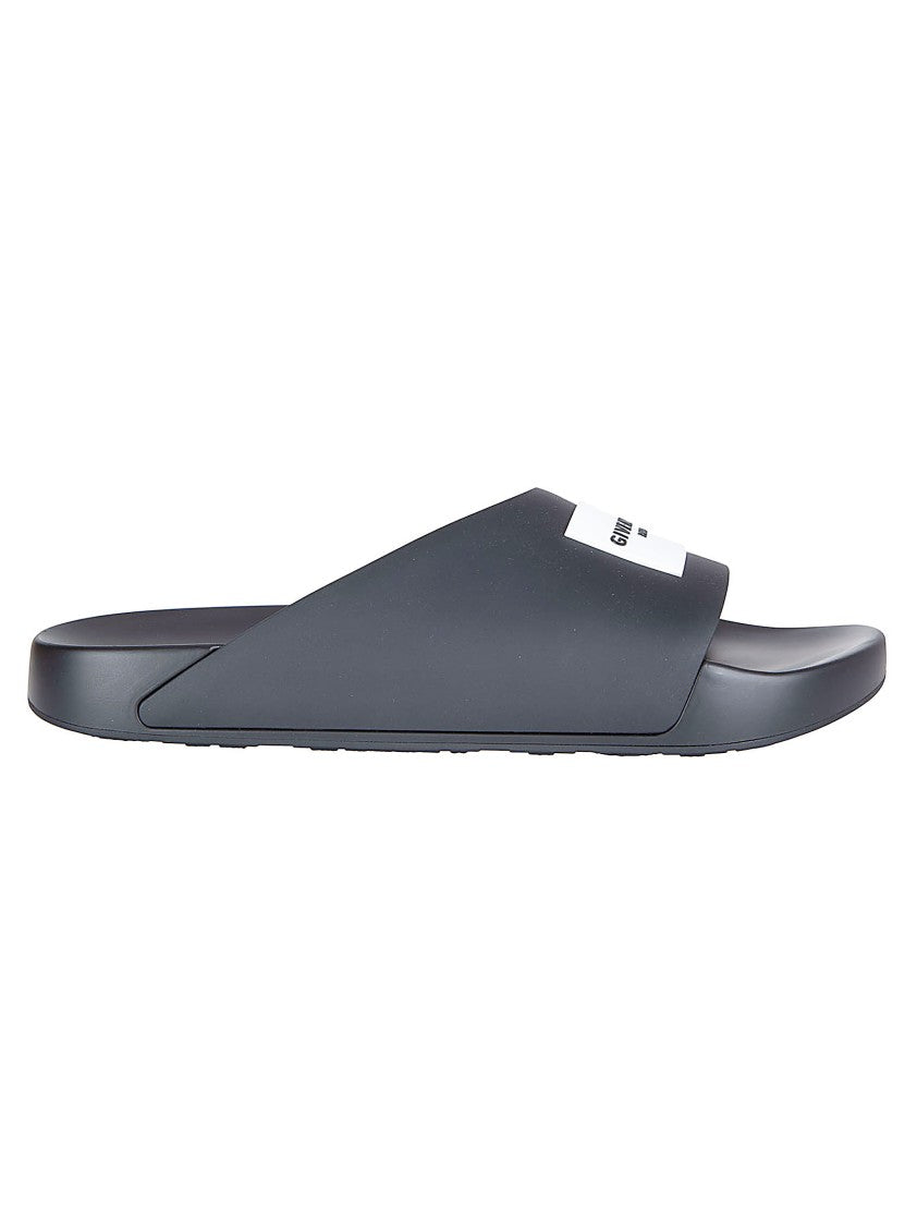Givenchy Asymmetrical Black Rubber Slides With Embossed Logo