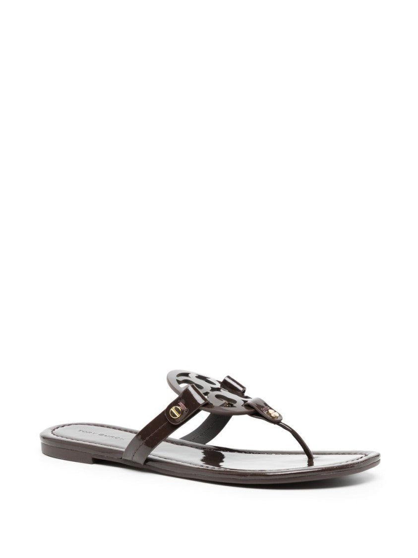 Tory Burch Glossy Black Flats With Circular Emblem Detail