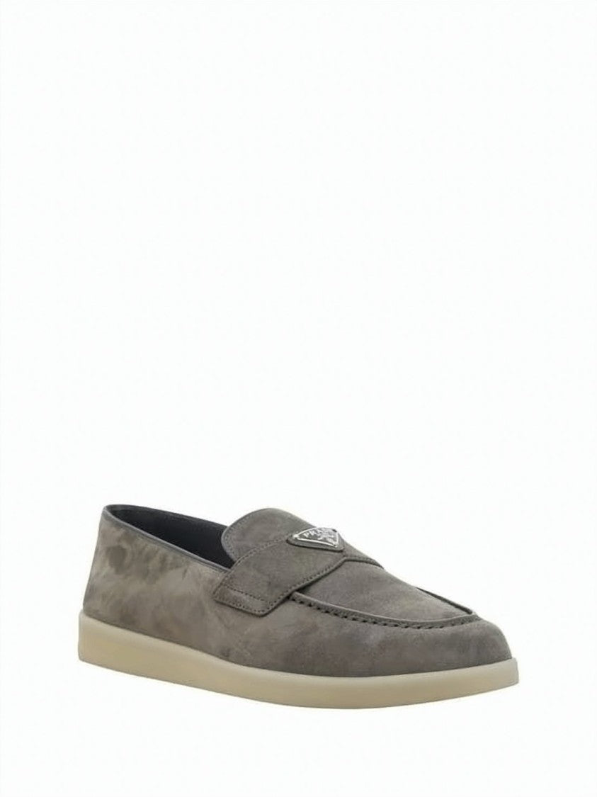 Prada Soft Suede Loafers With Metallic Emblem