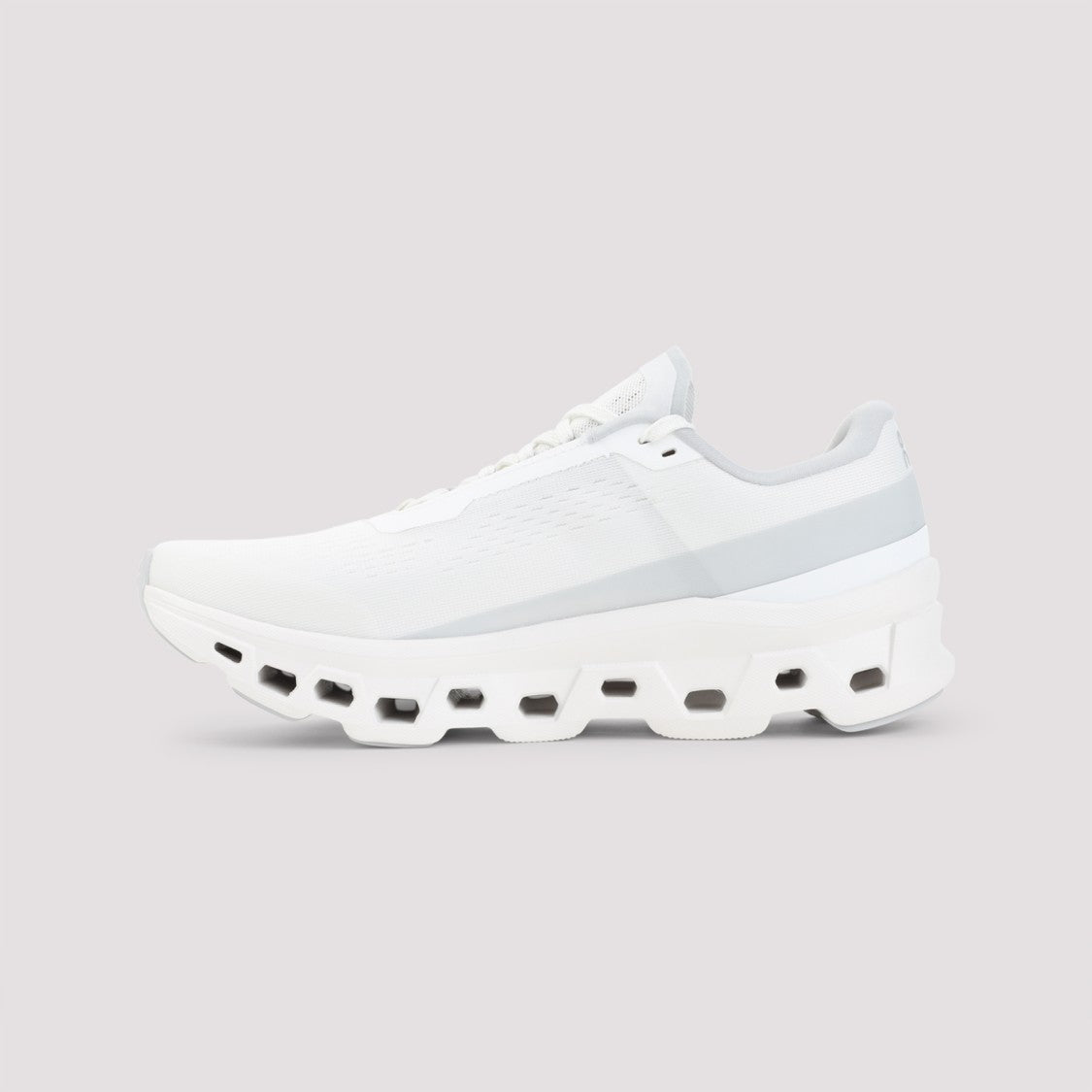 On Lightweight White Sneakers With Distinctive Cushioning Sole
