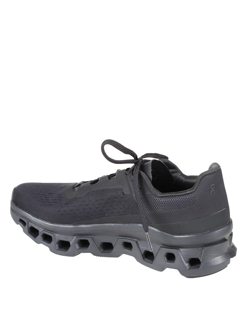 On Running Black Sneakers With Breathable Mesh Upper And Distinctive Sole