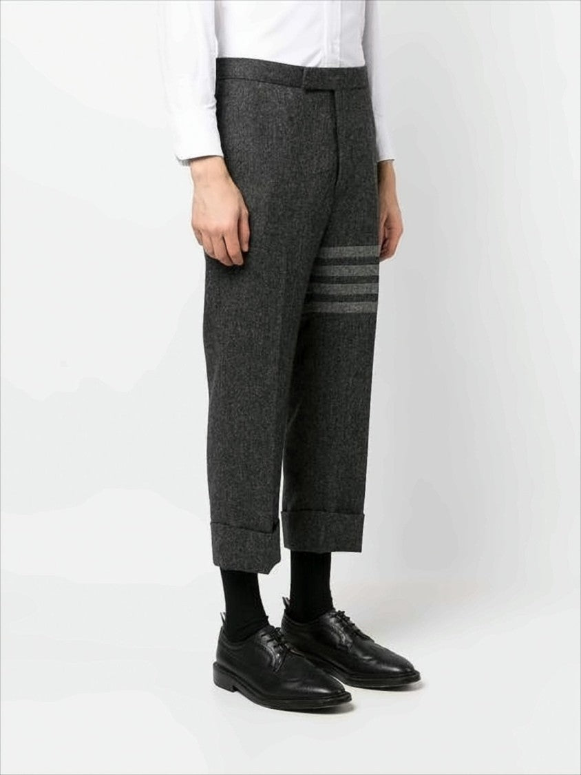Thom Browne Tailored Dark Grey Wool Suit Pants With Cuffed Hem And Signature Stripes