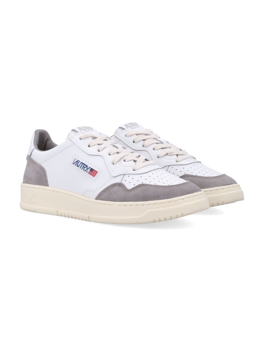 Autry Low-Top Sneakers With Smooth And Perforated Leather Design
