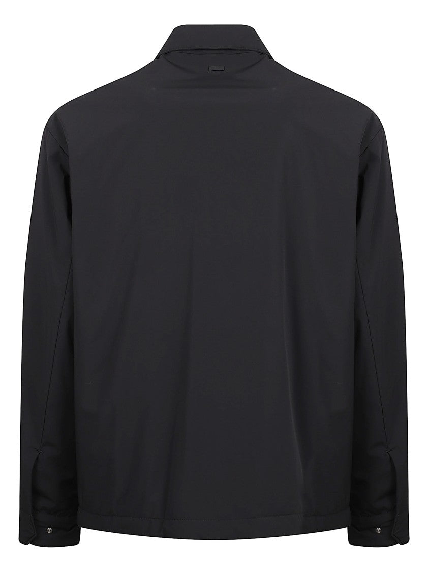 Herno Minimalist Jacket With Concealed Closure And Adjustable Cuffs