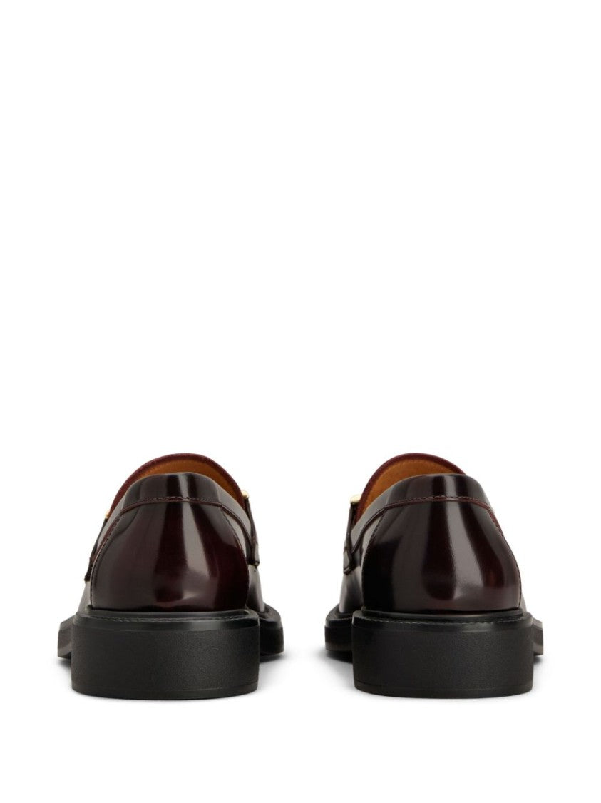 Tod's Polished Burgundy Loafers With Decorative Metal Bar