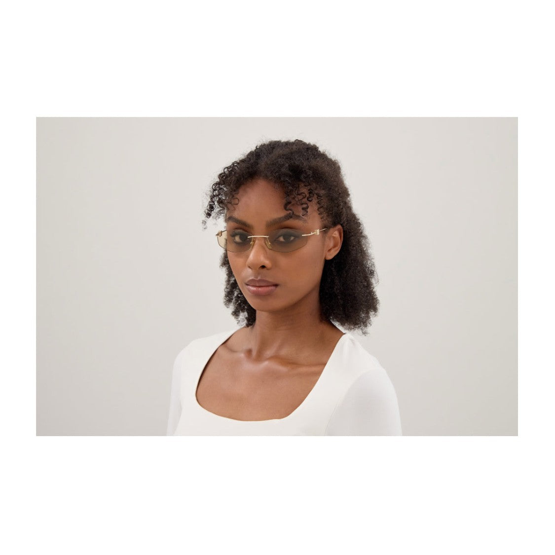 Balenciaga Gold Metal Sunglasses With Brown Lenses And Geometric Accents
