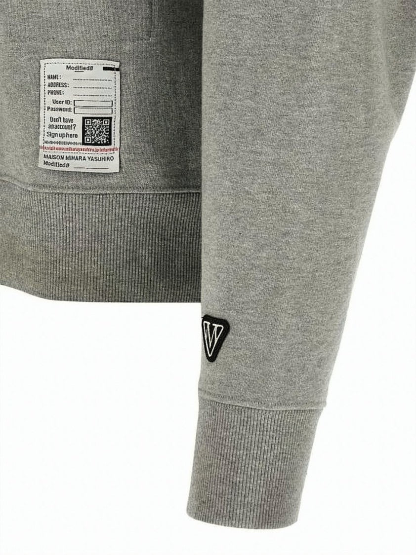 Maison Mihara Yasuhiro Grey Crewneck Sweatshirt With Distressed Orange Text
