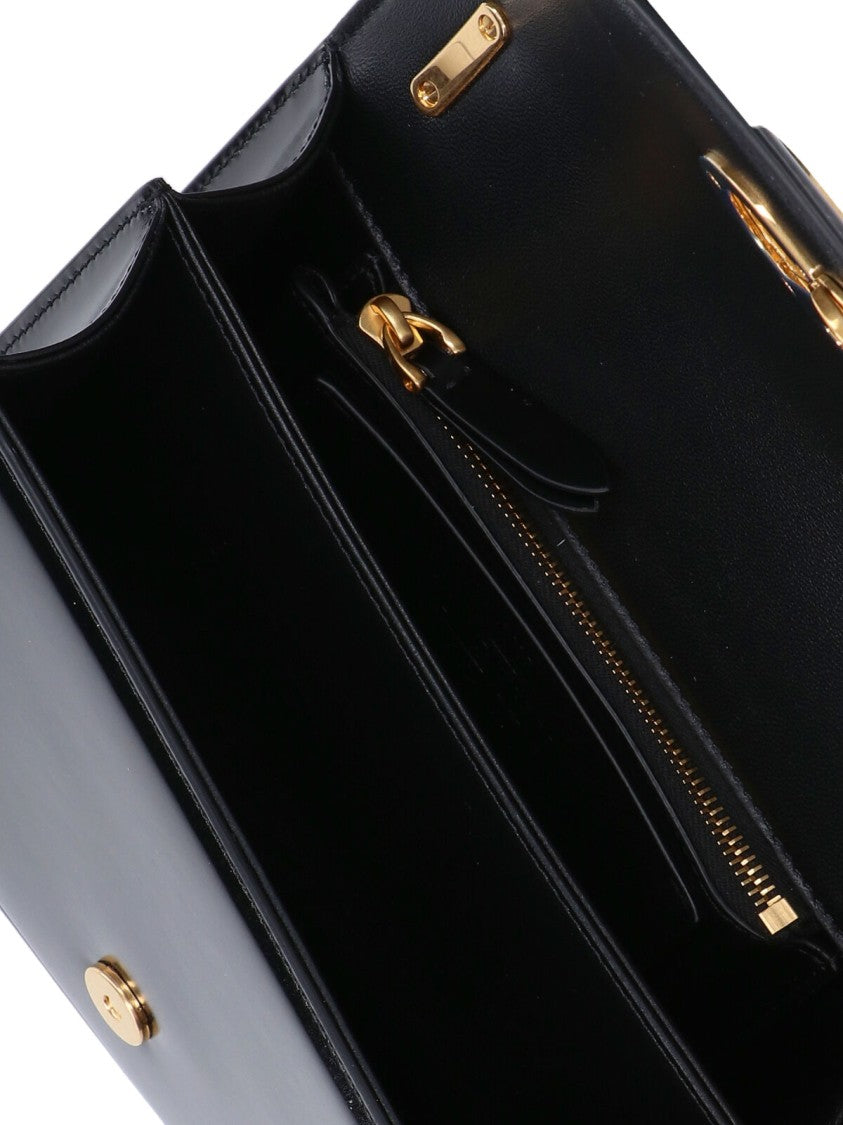 Valentino Garavani Structured Black Handbag With Gold-Tone Emblem And Chain Strap