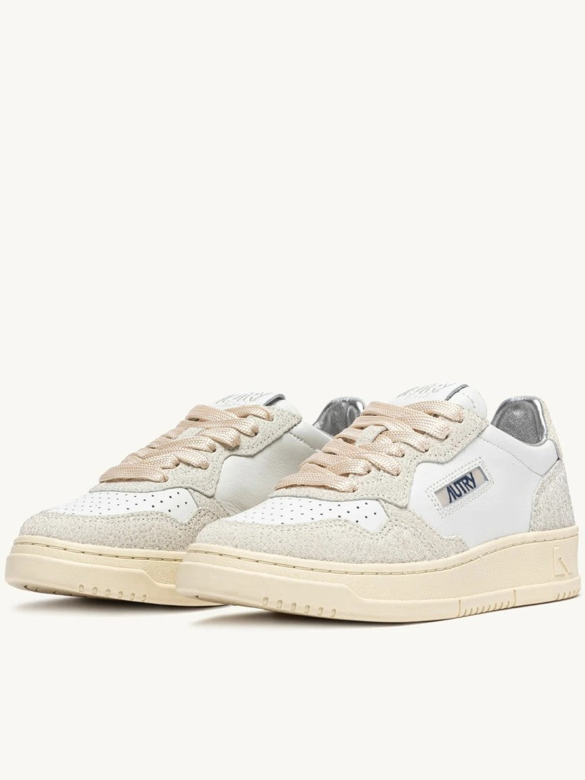 Autry Low-Top Sneakers With Perforated Detailing And Vintage Aesthetic