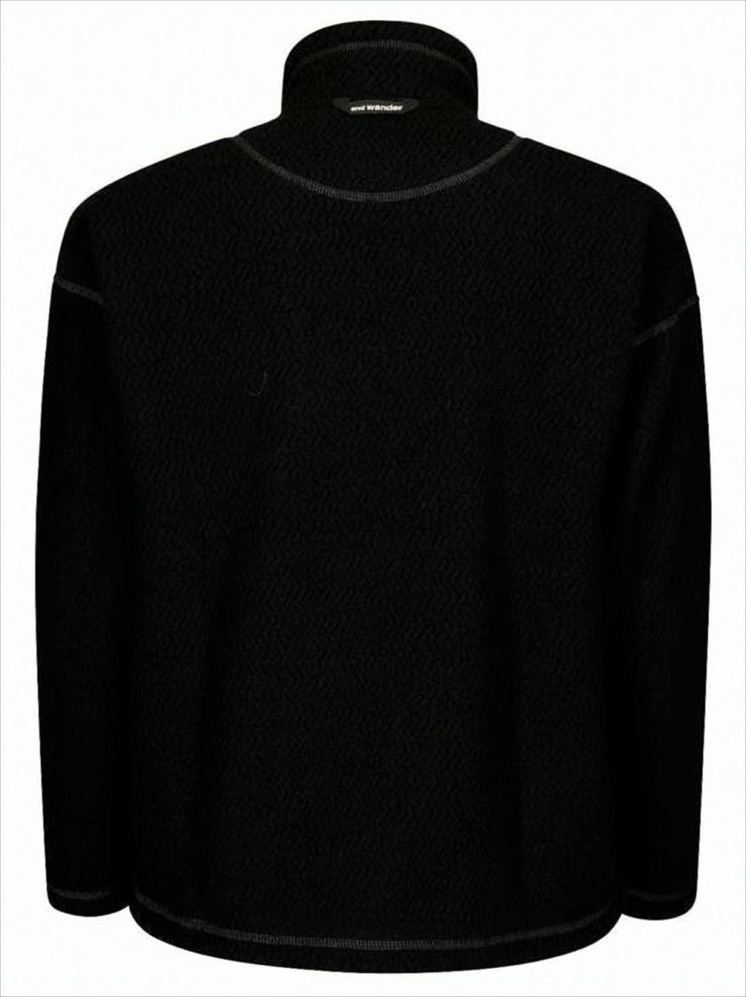 And Wander Textured Black Jacket With High Collar And Unique Pocket Design