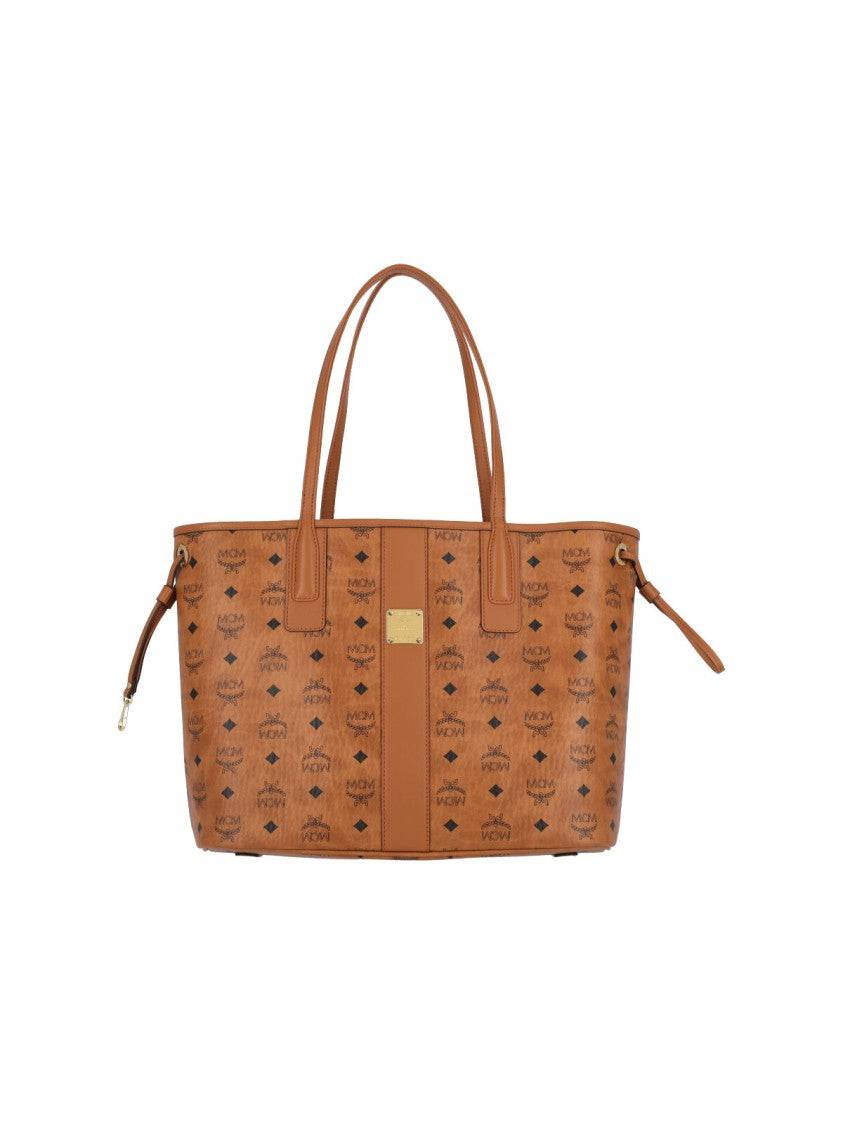 Mcm Structured Brown Bag With Distinctive Logo Pattern
