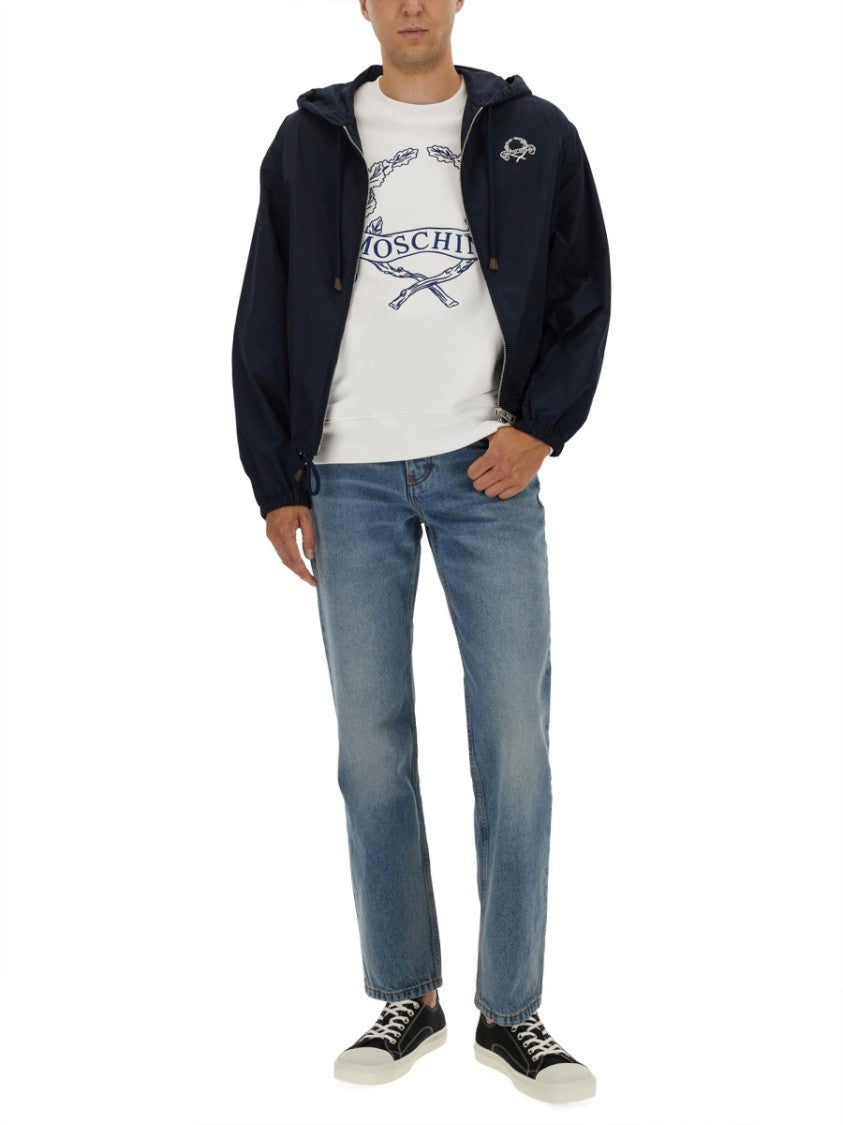 Moschino Hooded Blue Nylon Jacket With Adjustable Hem