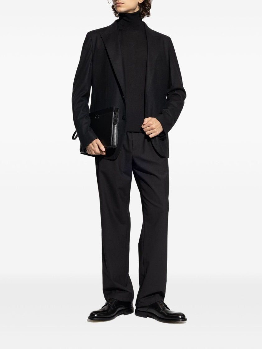 Dolce & Gabbana Fitted Black Turtleneck Sweater With Embossed Detail