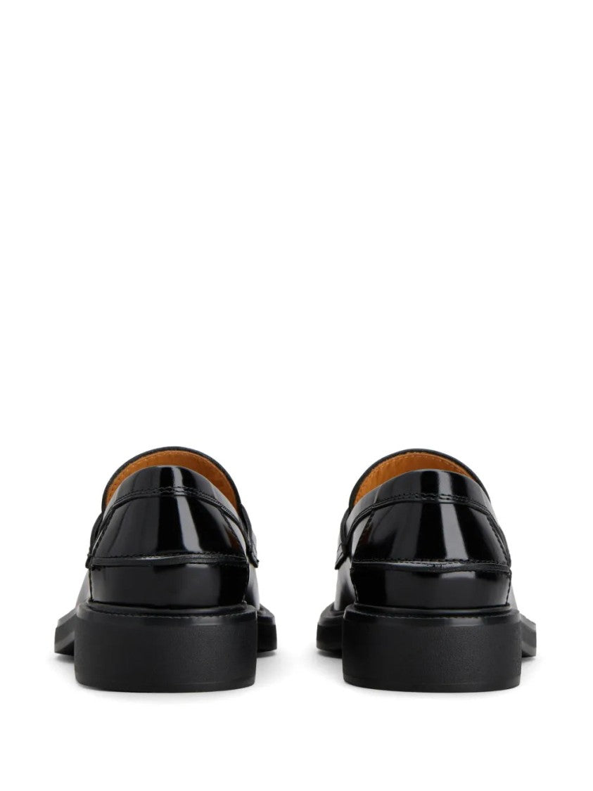 Tod's Glossy Black Leather Loafers With Decorative Emblem