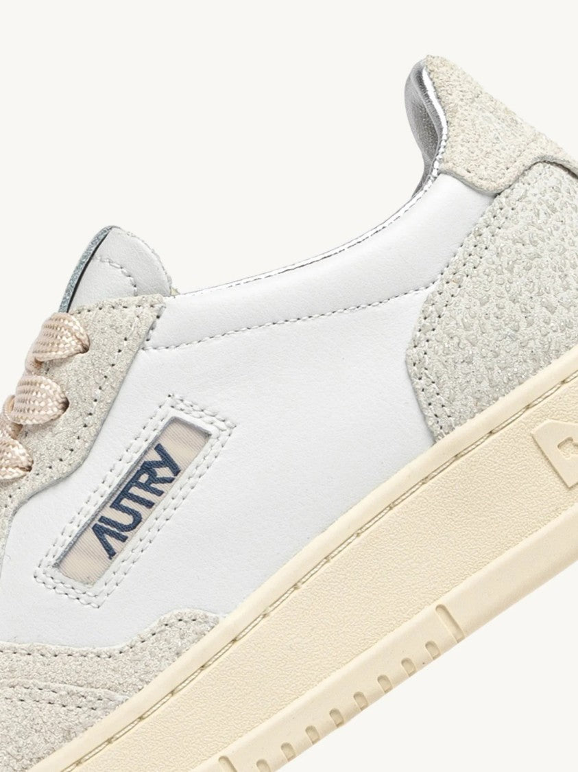 Autry Low-Top Sneakers With Perforated Detailing And Vintage Aesthetic