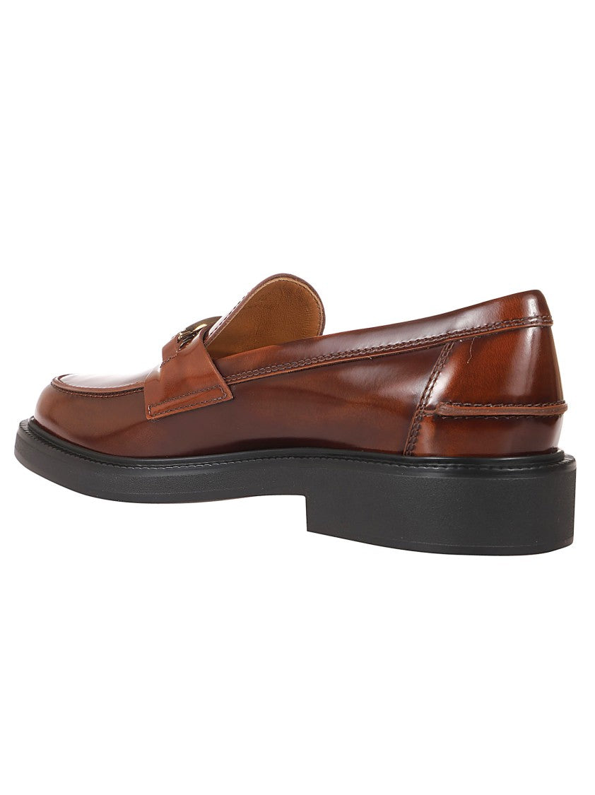 Tod's Moccasin Shoes With Decorative Emblem And Rubber Sole