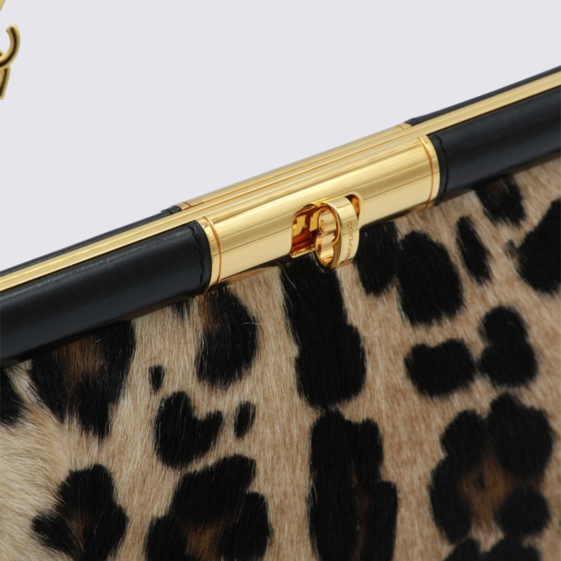 Dolce & Gabbana Plush Leopard Print Handbag With Structured Frame And Gold Accents