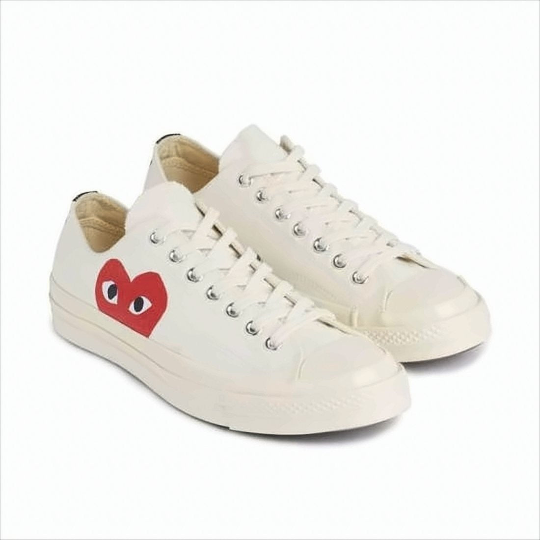 Comme Des Garçons Low-Top Sneakers With Distinctive Heart Graphic And Minimalist Design