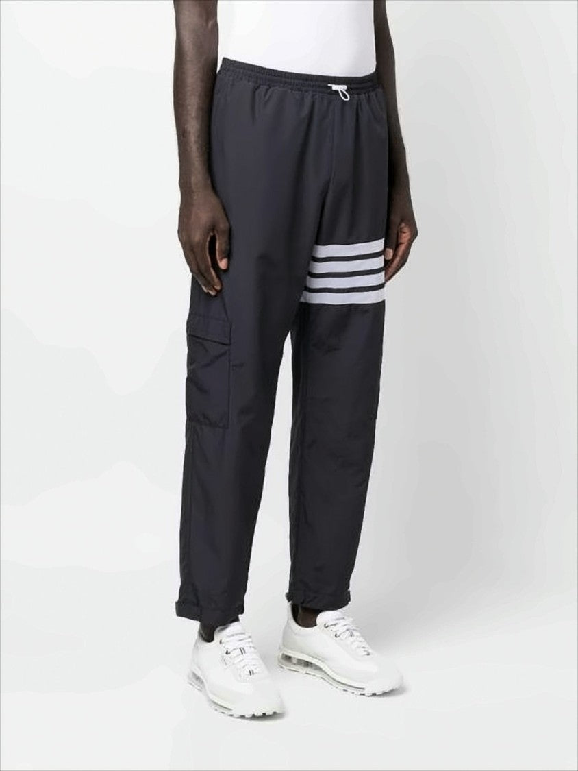 Thom Browne Sleek Black Training Jogger Pants With Distinctive Stripes