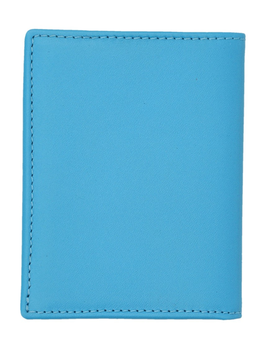 Comme Des Garçons Bifold Wallet With Vibrant Blue Exterior