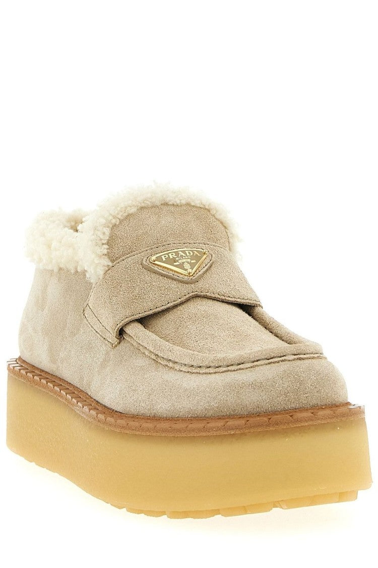 Prada Minimalist Flat Shoes With Rounded Toe And Low-Profile Sole