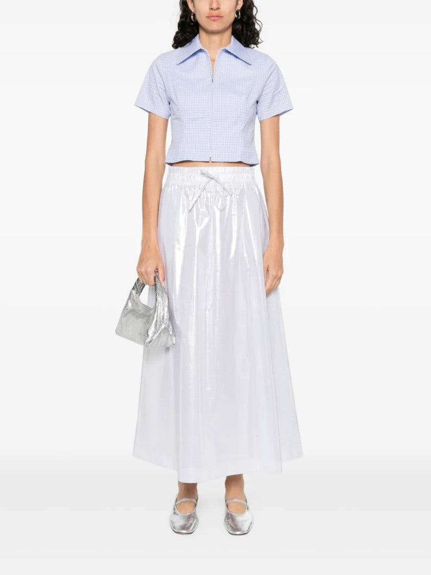 D. Exterior Smooth Silhouette Subtle Texture Skirt
