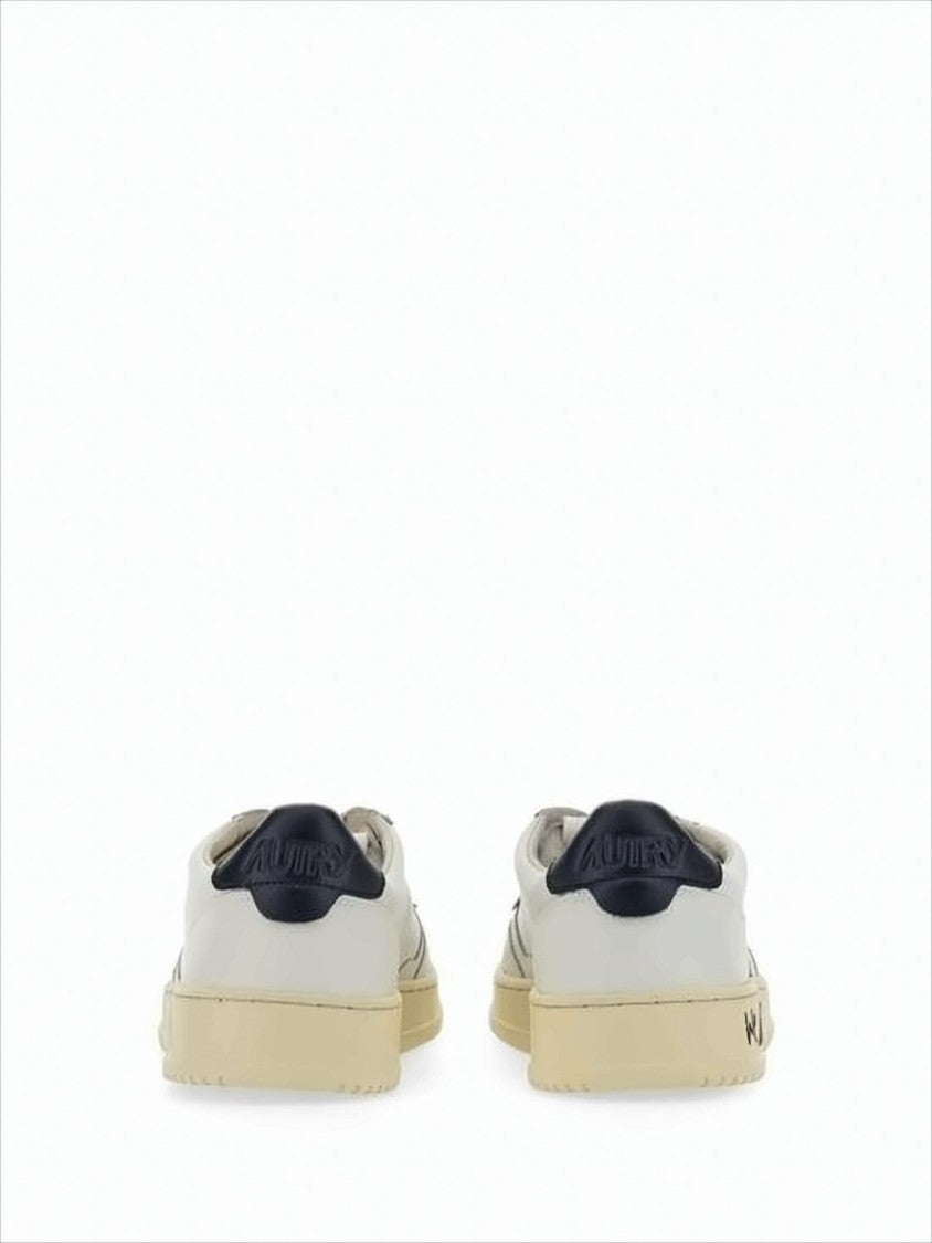 Autry Low-Top Sneakers With Perforated Detailing And Vintage Aesthetics