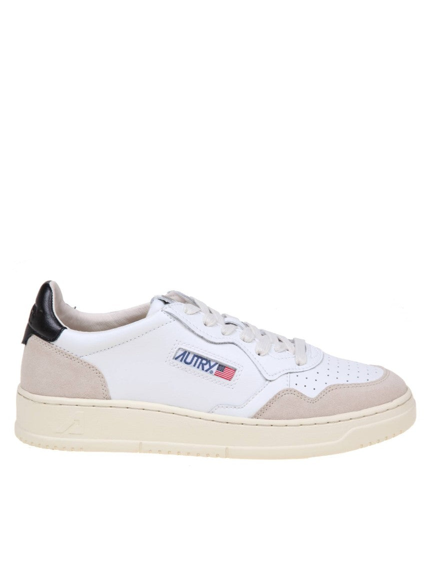 Autry Sneakers In Black And White Leather And Suede