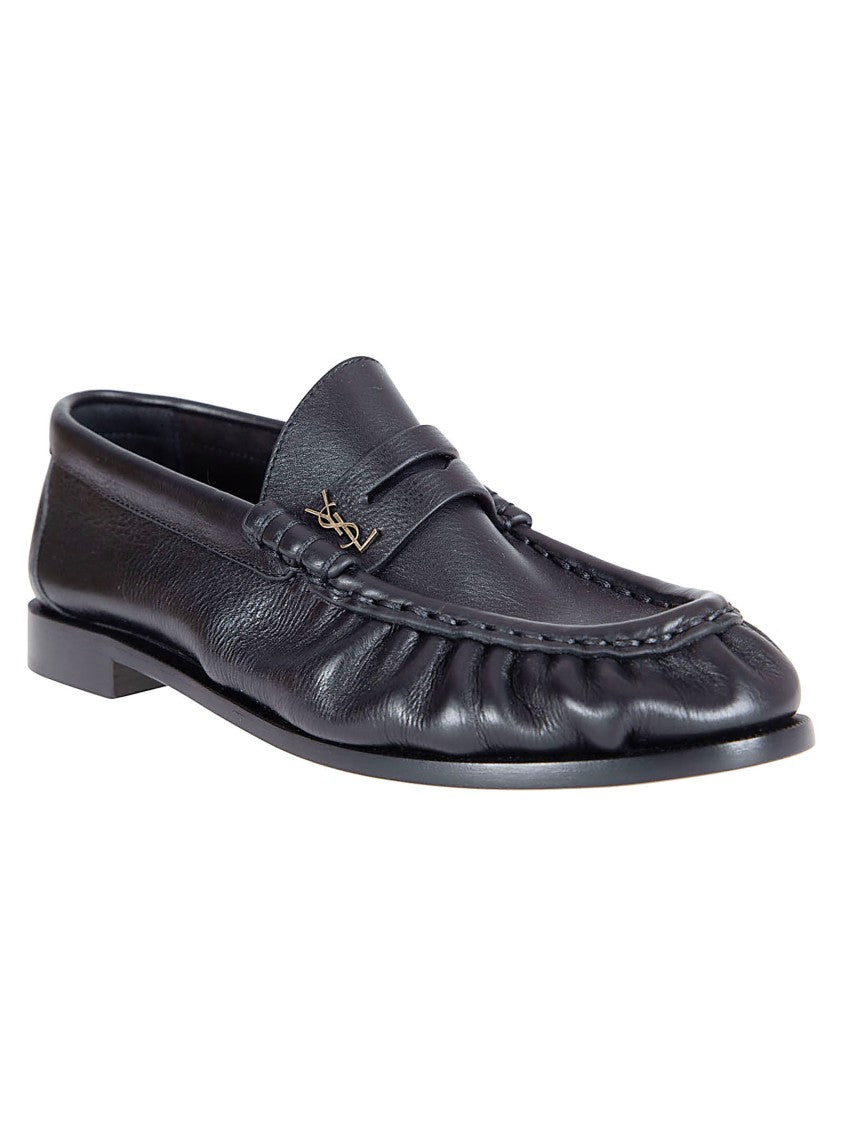 Saint Laurent Hand-Stitched Moccasin-Style Flats With Bronze Detailing