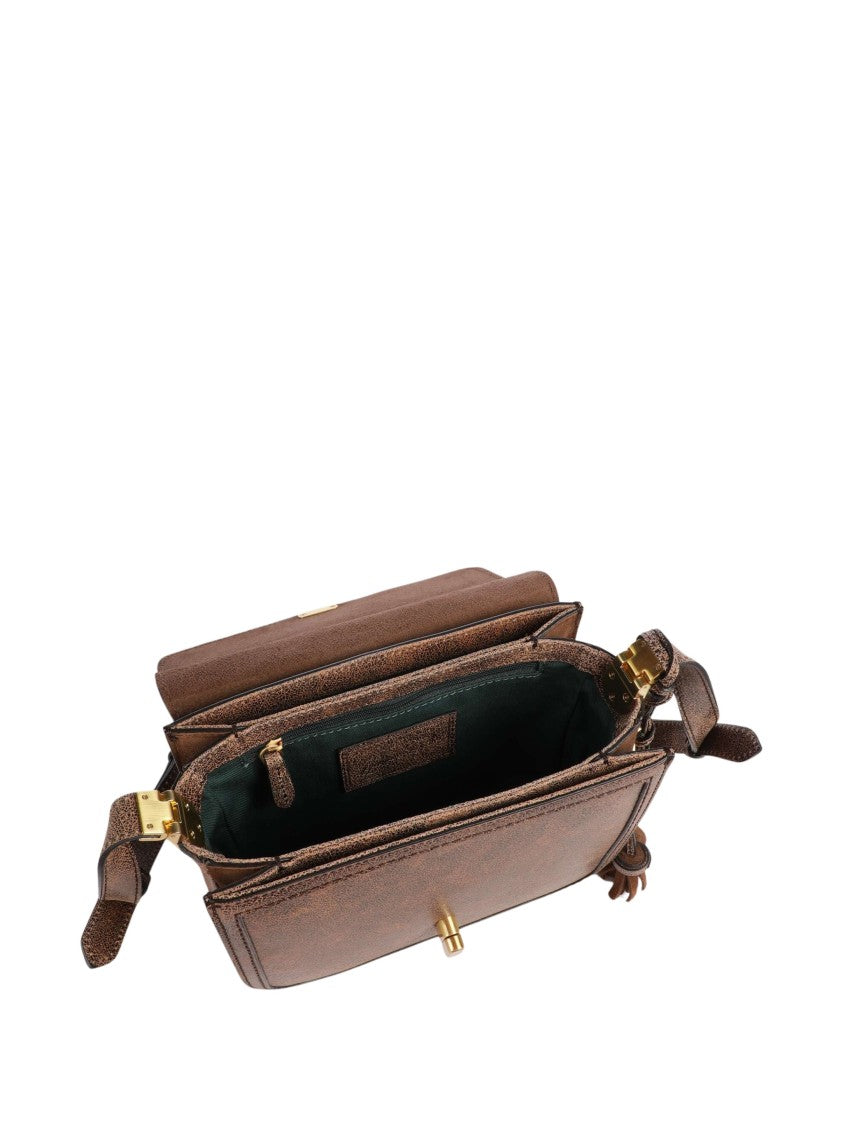 The Bridge Textured Leather Shoulder Bag With Gold Accents And Tassel