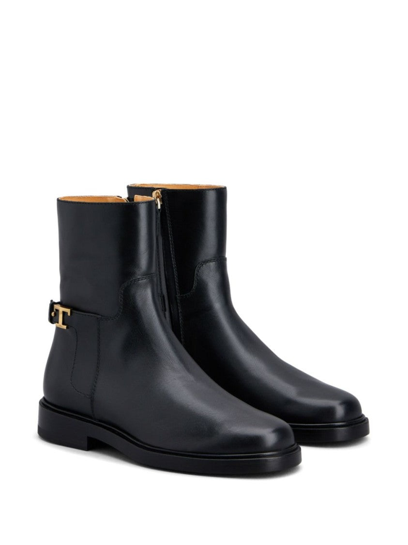 Tod's Minimalist Black Ankle Boots With Gold Accent