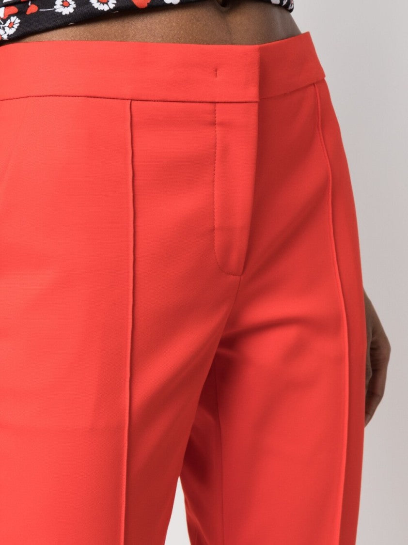Moschino Slim Cut Cropped Trousers With Exposed-Seam Detailing