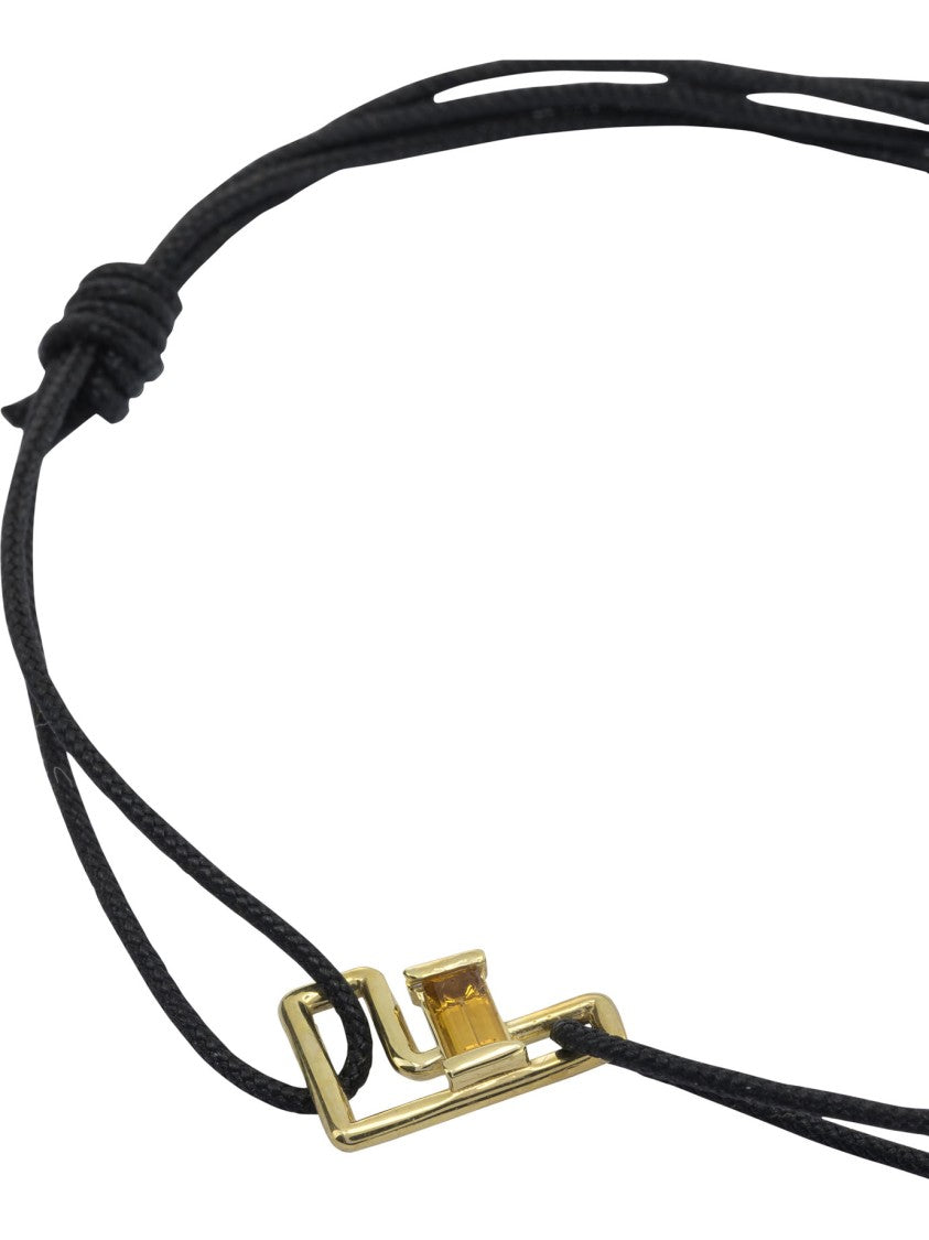 Aliita Adjustable Black Cord Bracelet With Citrine Insert And Gold-Tone Pendant