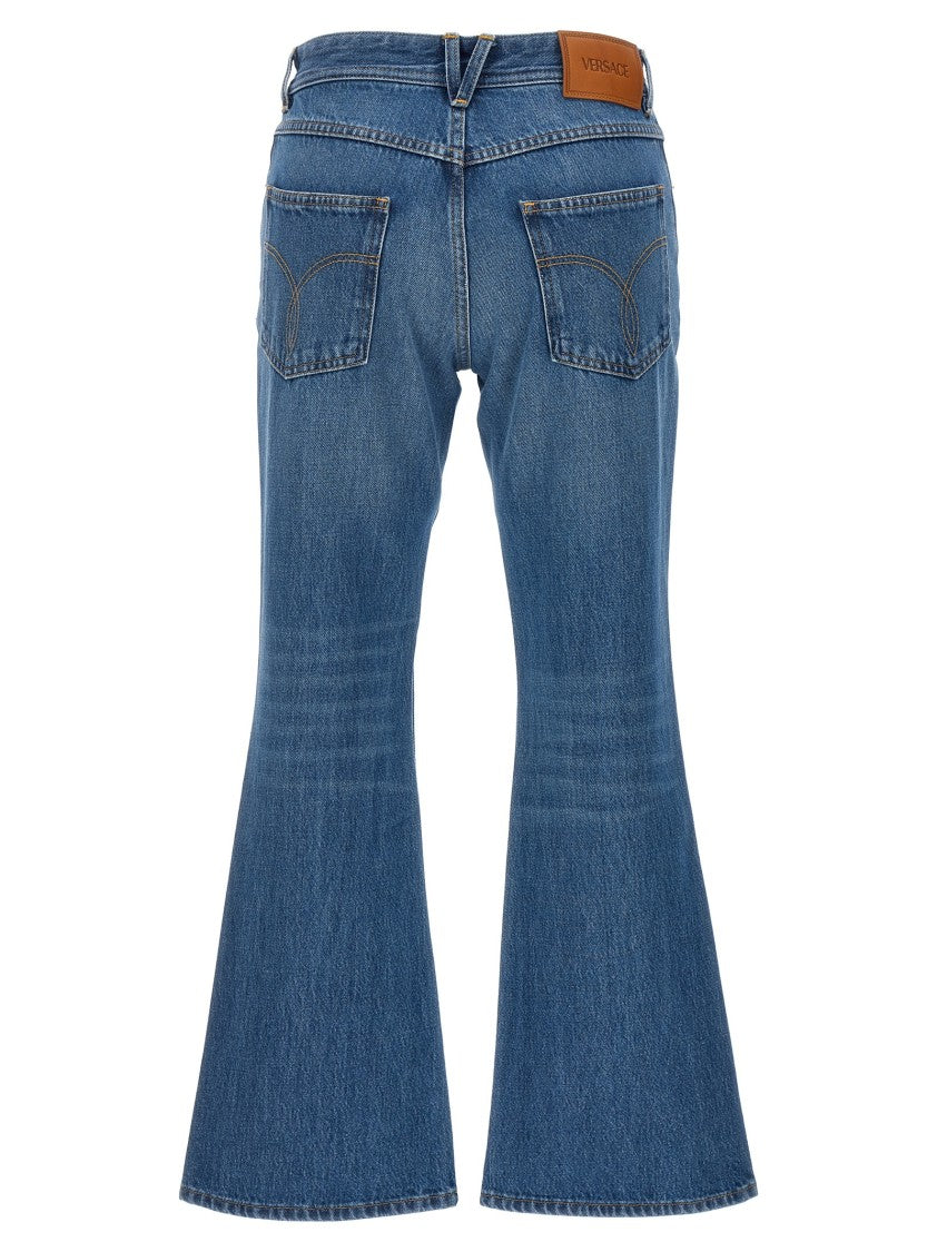 Versace Flared Denim Jeans With Metallic Jellyfish Detail