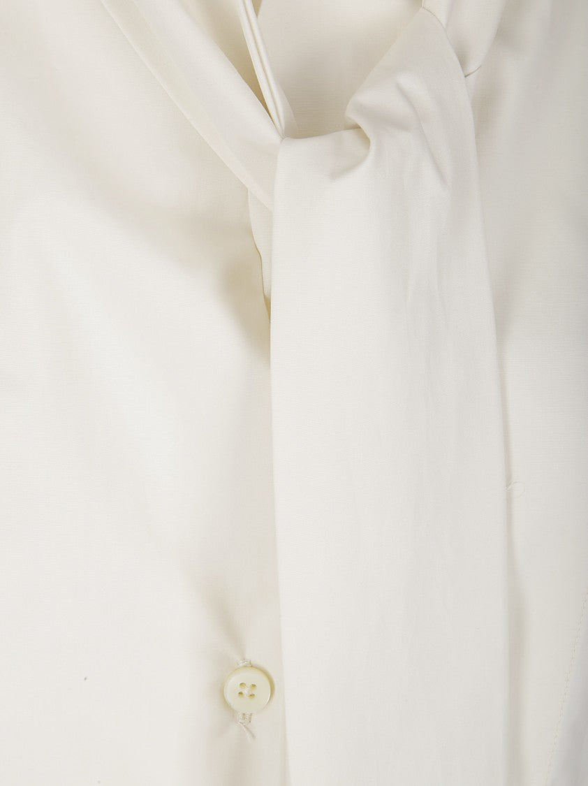 The Latest Long-Sleeved Ecru Shirt With Tie-Neck Collar