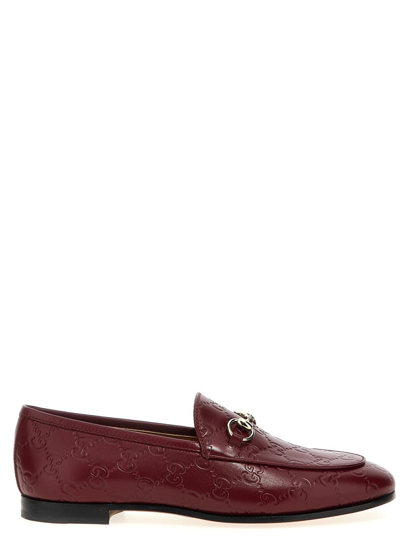 Gucci Gg Leather Jordaan Loafers With Metal Clamp Detail