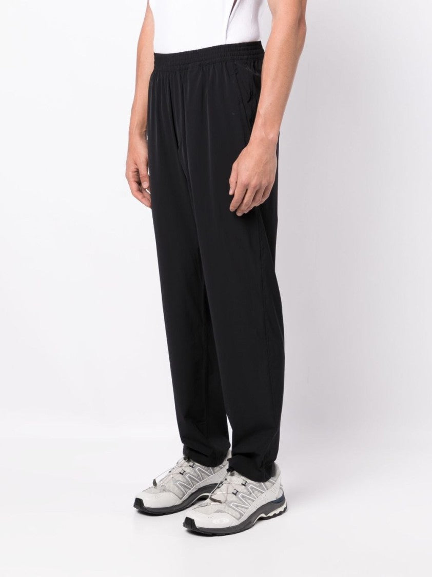 True Tribe Elasticated-Waist Trousers With Logo Patch And Slim Cut