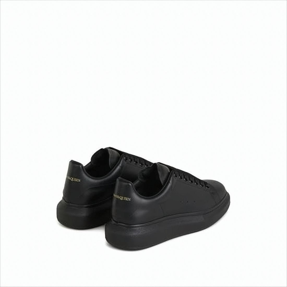Alexander Mcqueen Monochromatic Black Calf Leather Sneakers
