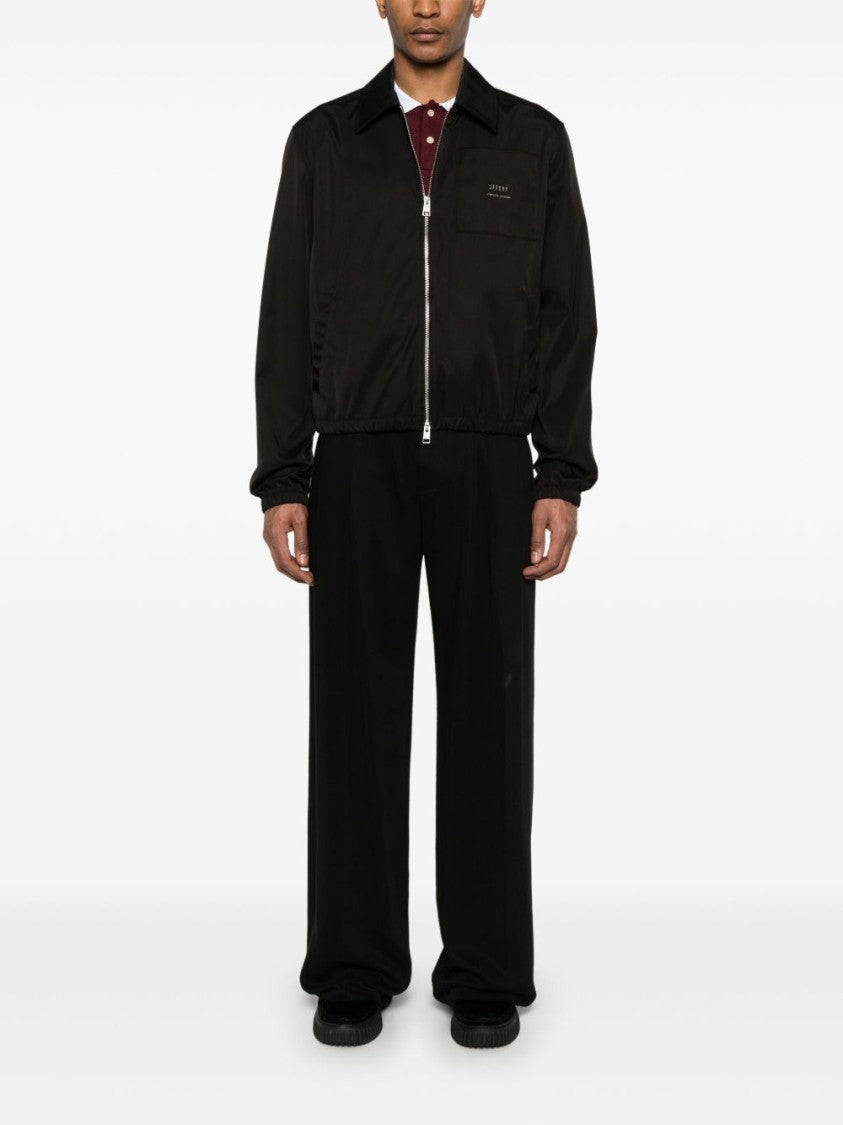 Ami Sleek Black Jacket With Versatile Two-Way Zip