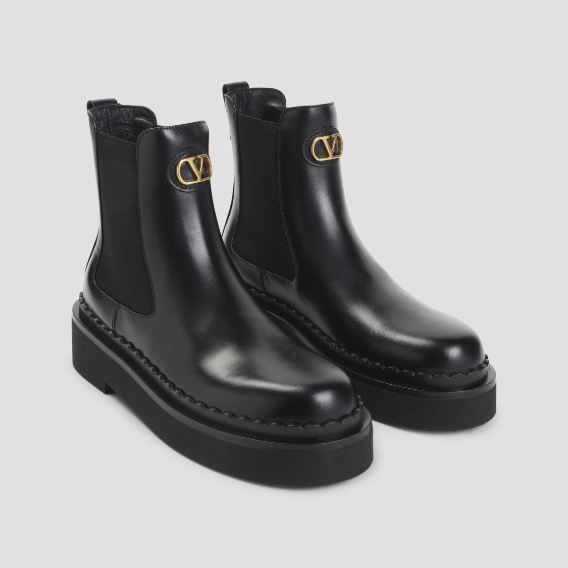 Valentino Garavani Black Leather Ankle Boots With Gold-Tone Logo