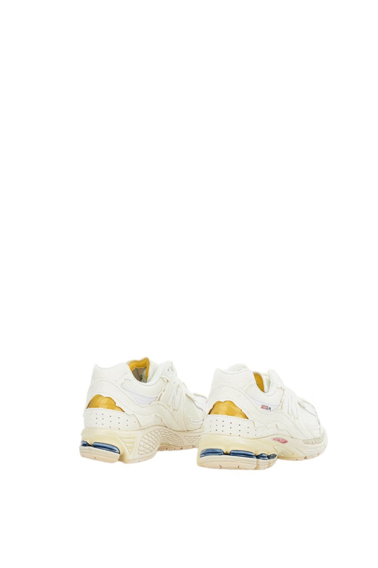 New Balance 2002R Protection Sneakers With Deconstructed Aesthetic