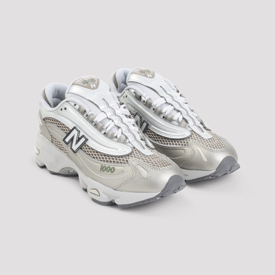 New Balance Metallic Finish Leather Sneakers With Chunky Sole