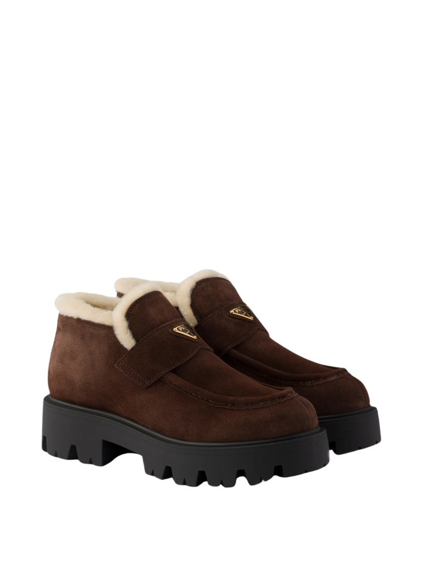 Prada Stride Shearling Lined Suede Boots