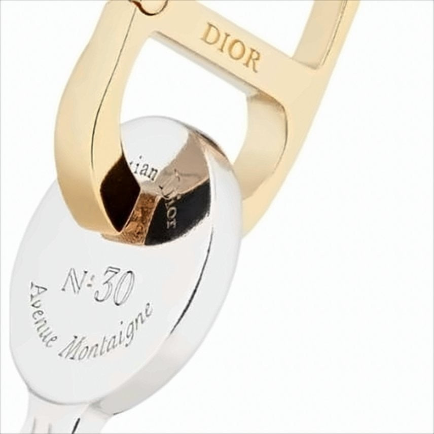 Christian Dior Circular Silver Keychain With Gold Clasp