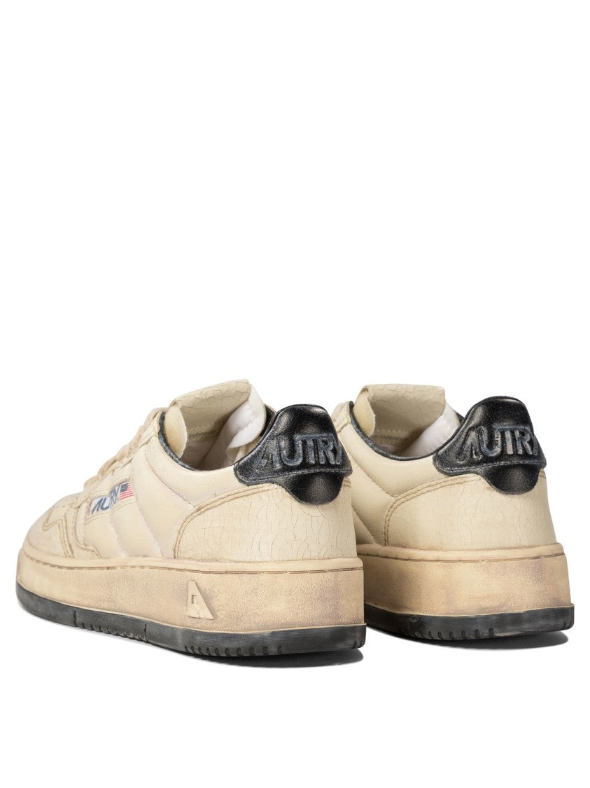 Autry Vintage-Inspired Leather Sneakers With Contrast Rubber Sole