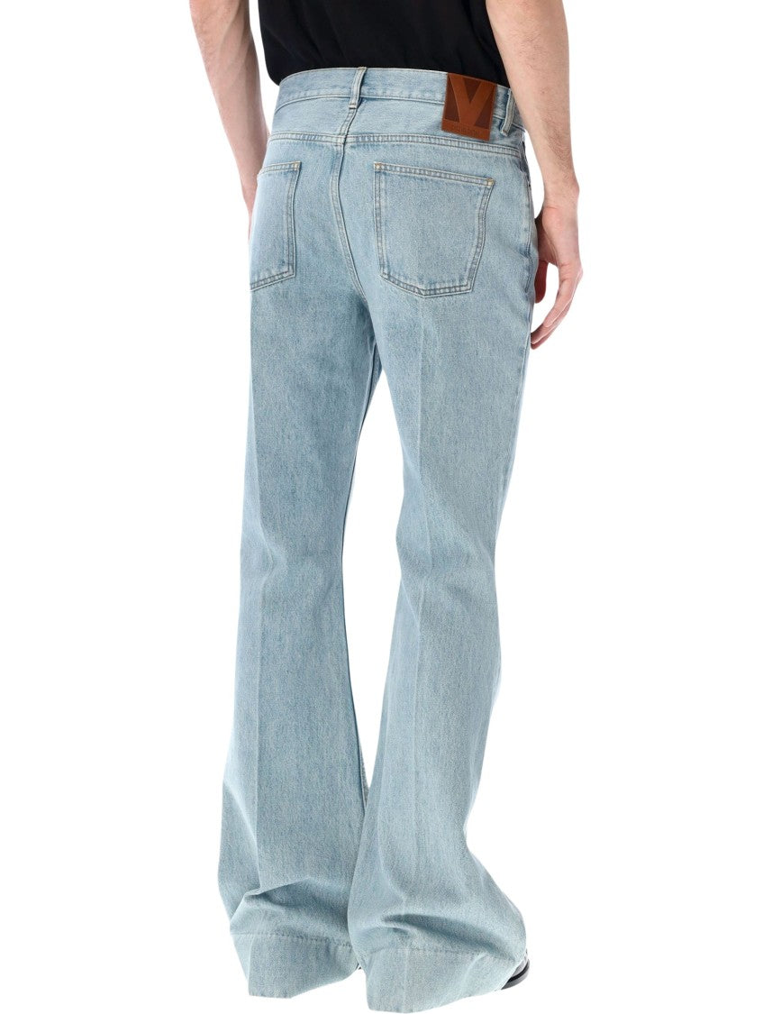 Valentino Garavani Light-Wash Flared Jeans With Iconic Branding Details